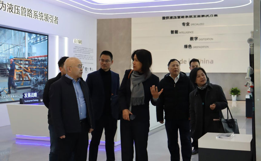 2023年12月13日，Parker中国FCG工厂总经理黄英一行莅临东升国际官网参观互换。